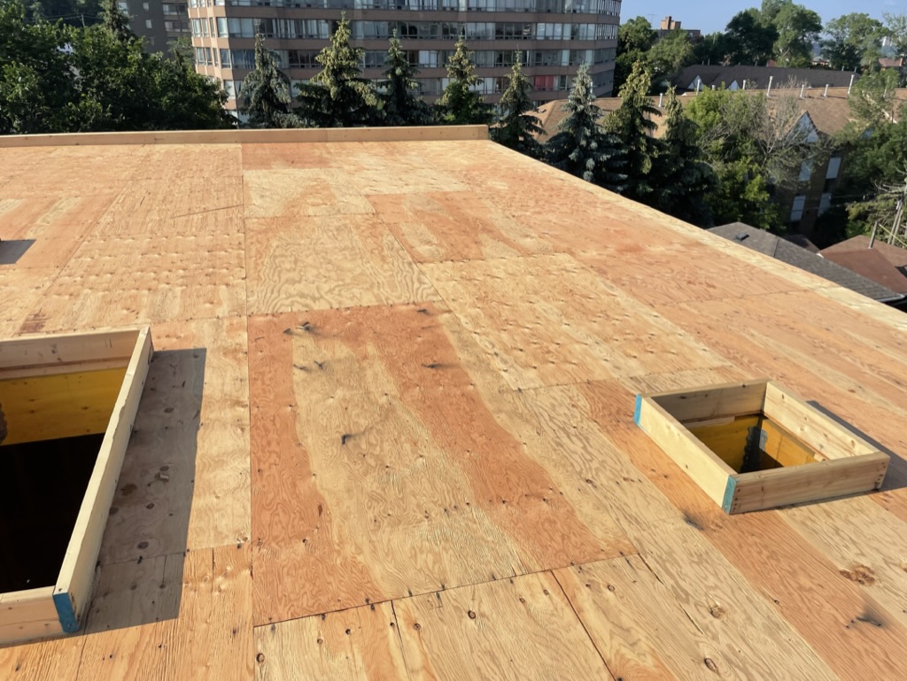 Flat Roof Slope And Sheathing. Roof Deck Replacements.